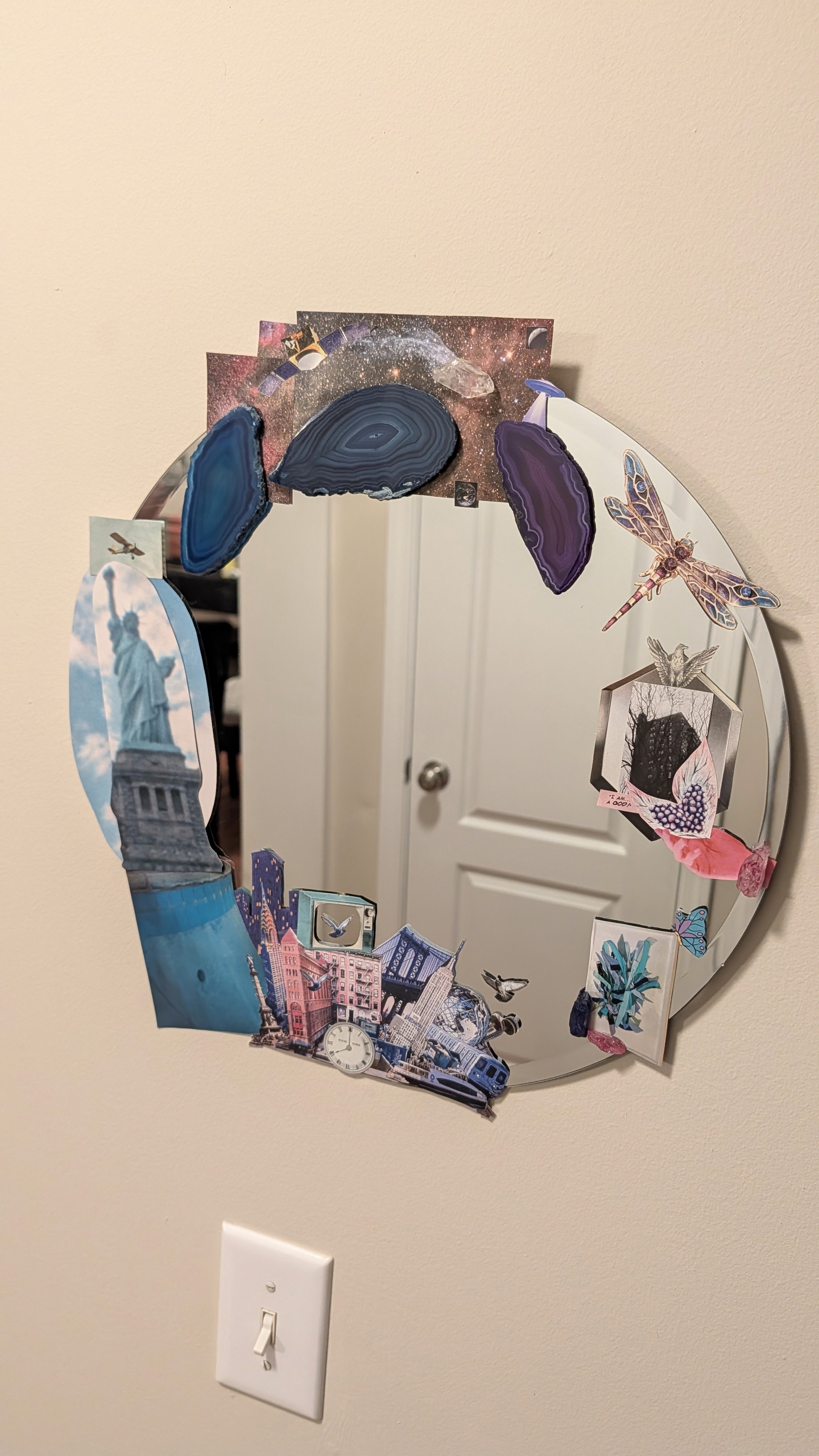 multimedia collage piece on a mirror