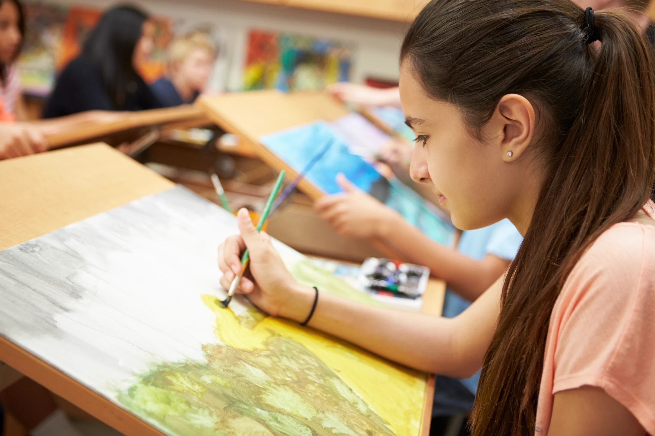 young girl painting