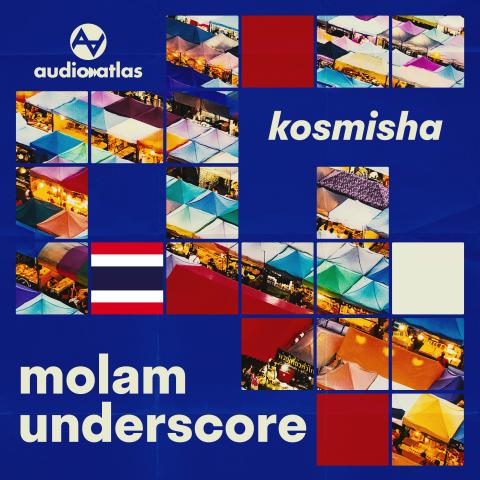 White branded cap with turquoise logo placed on fresh lemons in a red bowl