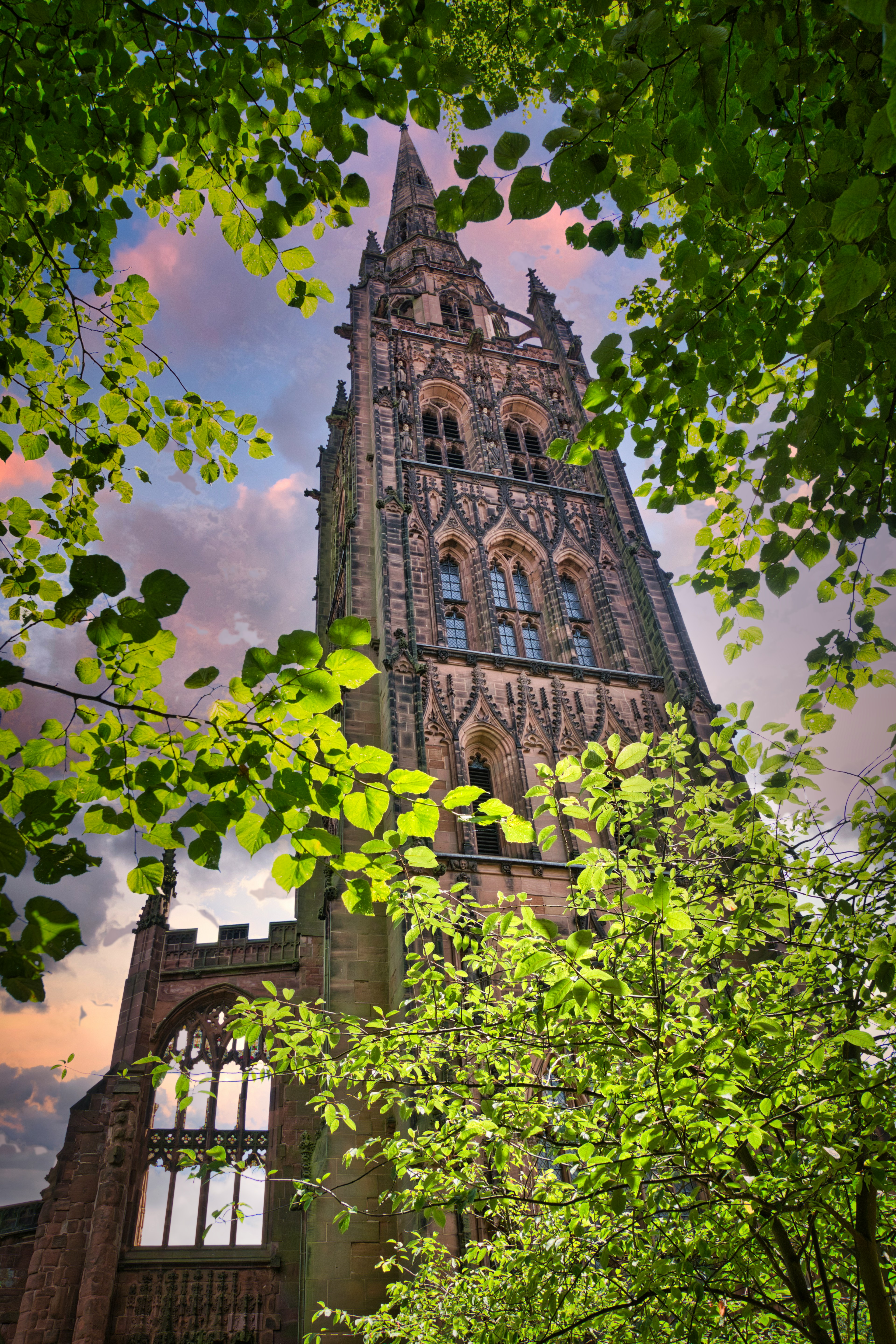 brown concrete church under cloudy sky