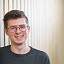 Profielfoto van Antoni Chen die lacht op een netwerkevenement