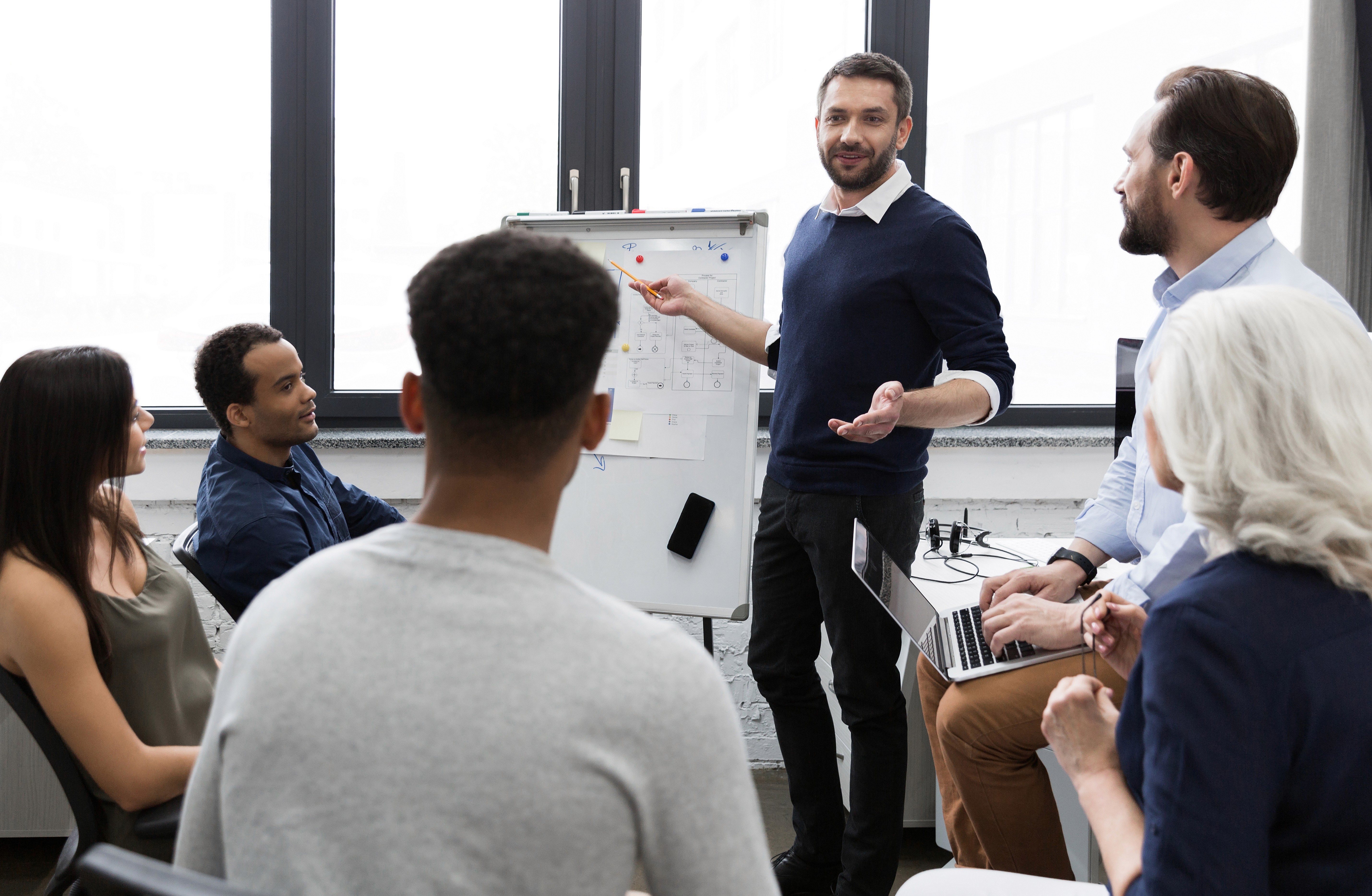 A group of people having a meeting