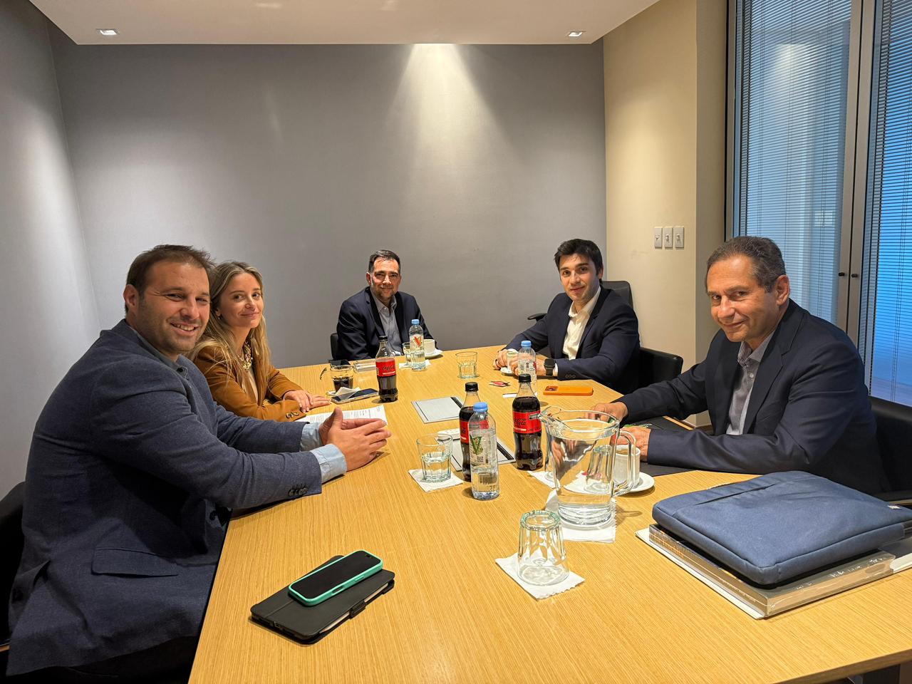 Torres y Lapenna junto a directivos del ORSNA.