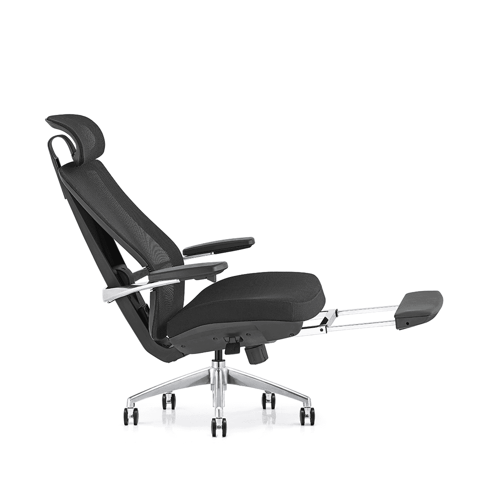 Side view of a reclining black ergonomic mesh office chair with an extended retractable footrest, adjustable headrest, and polished aluminum base.