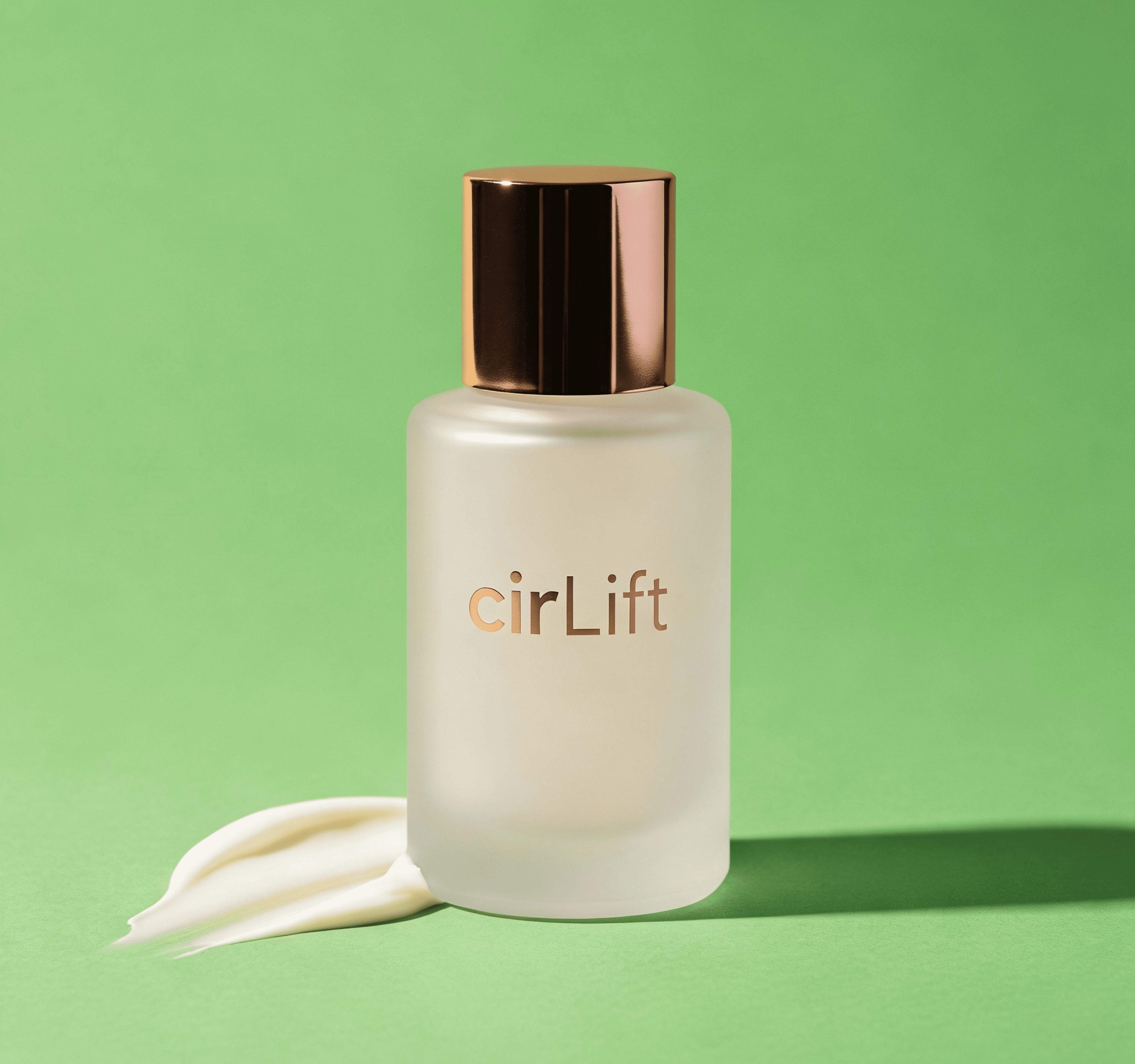 Frosted glass 'cirLift' skincare bottle with rose gold cap on green background