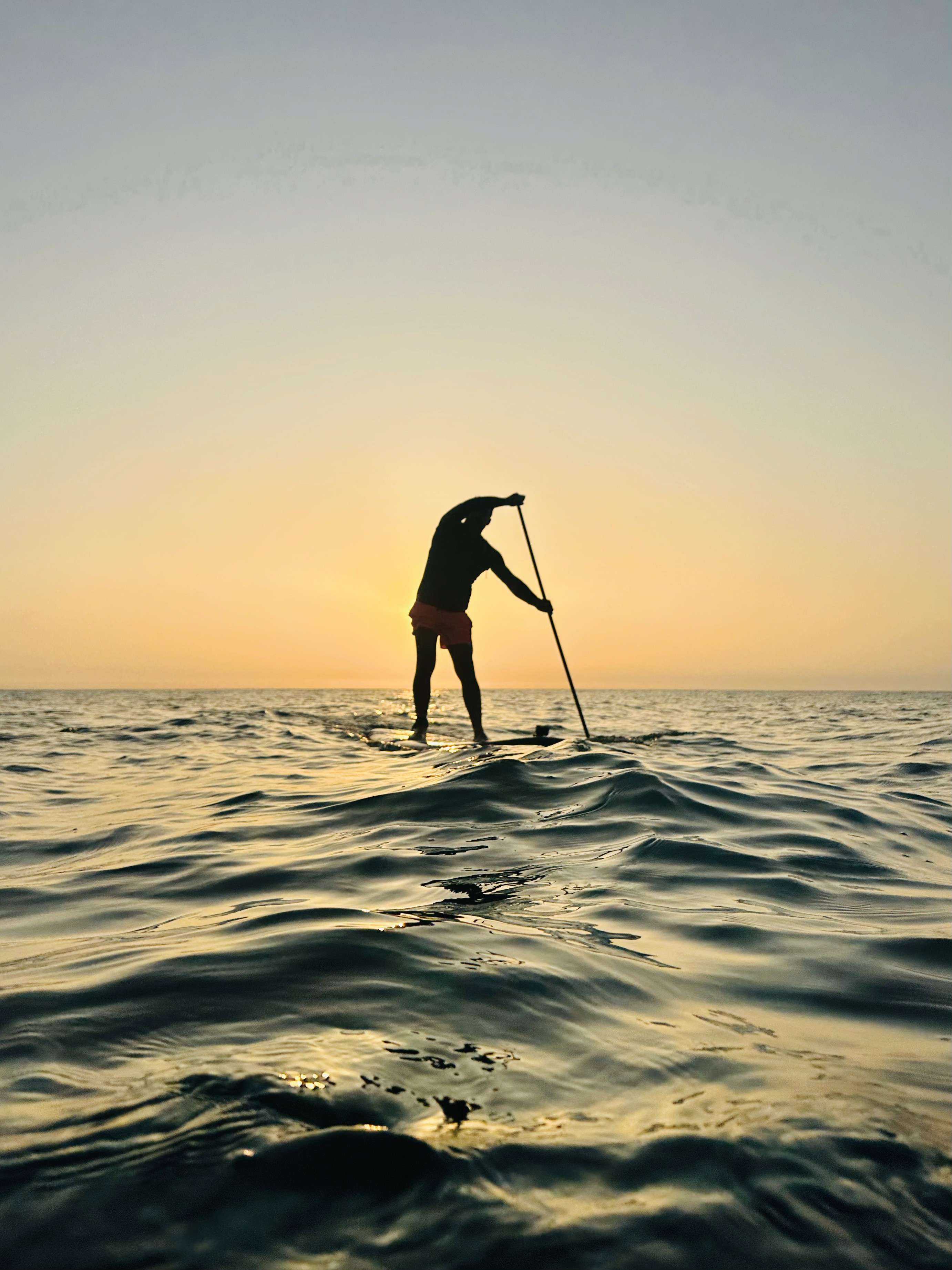 a man on a paddle board