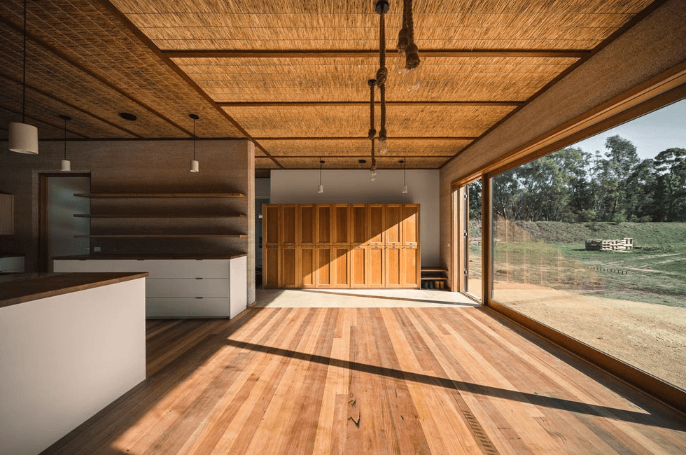 A very spacious house showing sunlight directly hitting the living room