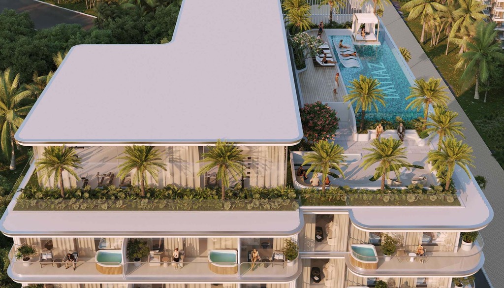 Aerial view of the Cove Edition 6 luxury apartment building, showcasing its modern architecture and surrounding landscape.
