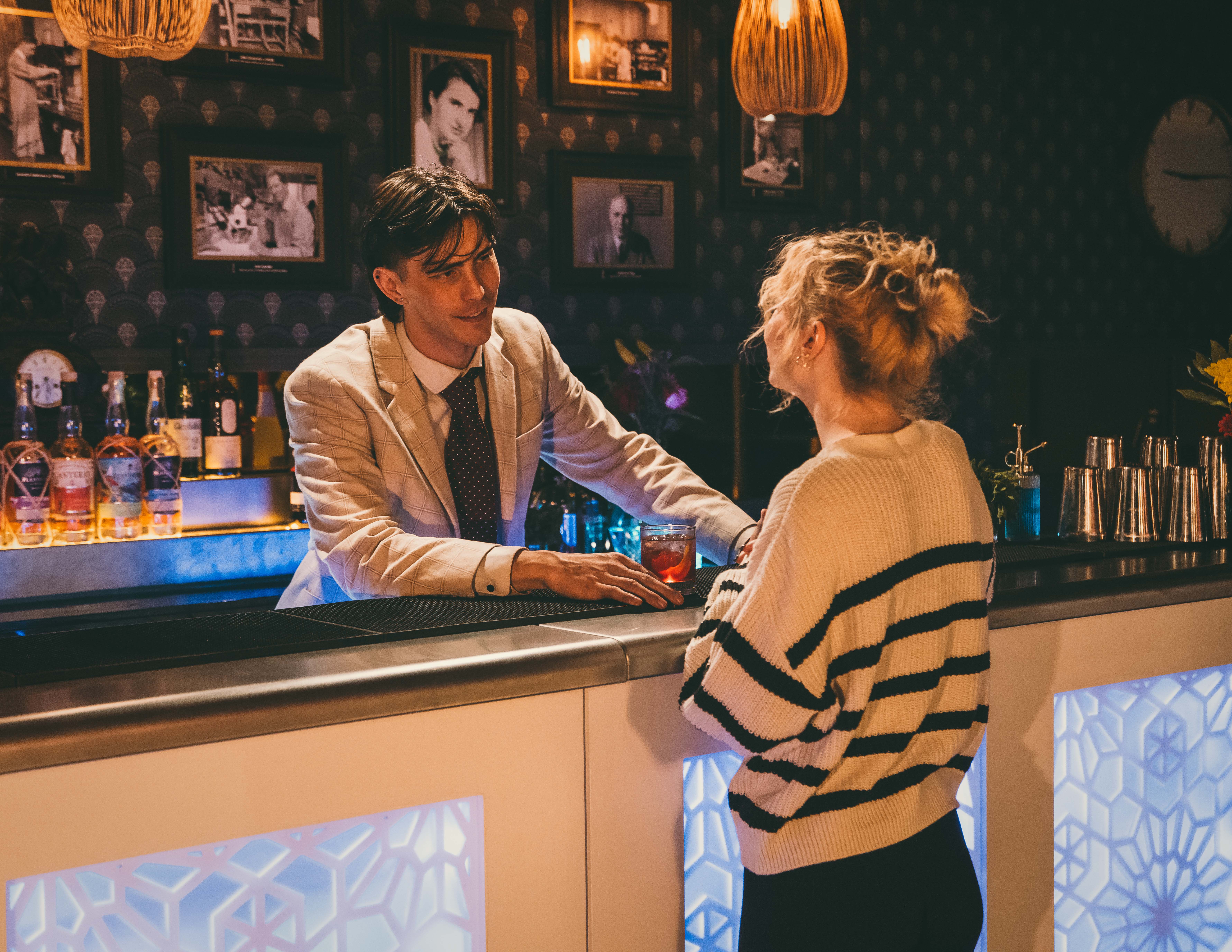 two men working on the roof of a house