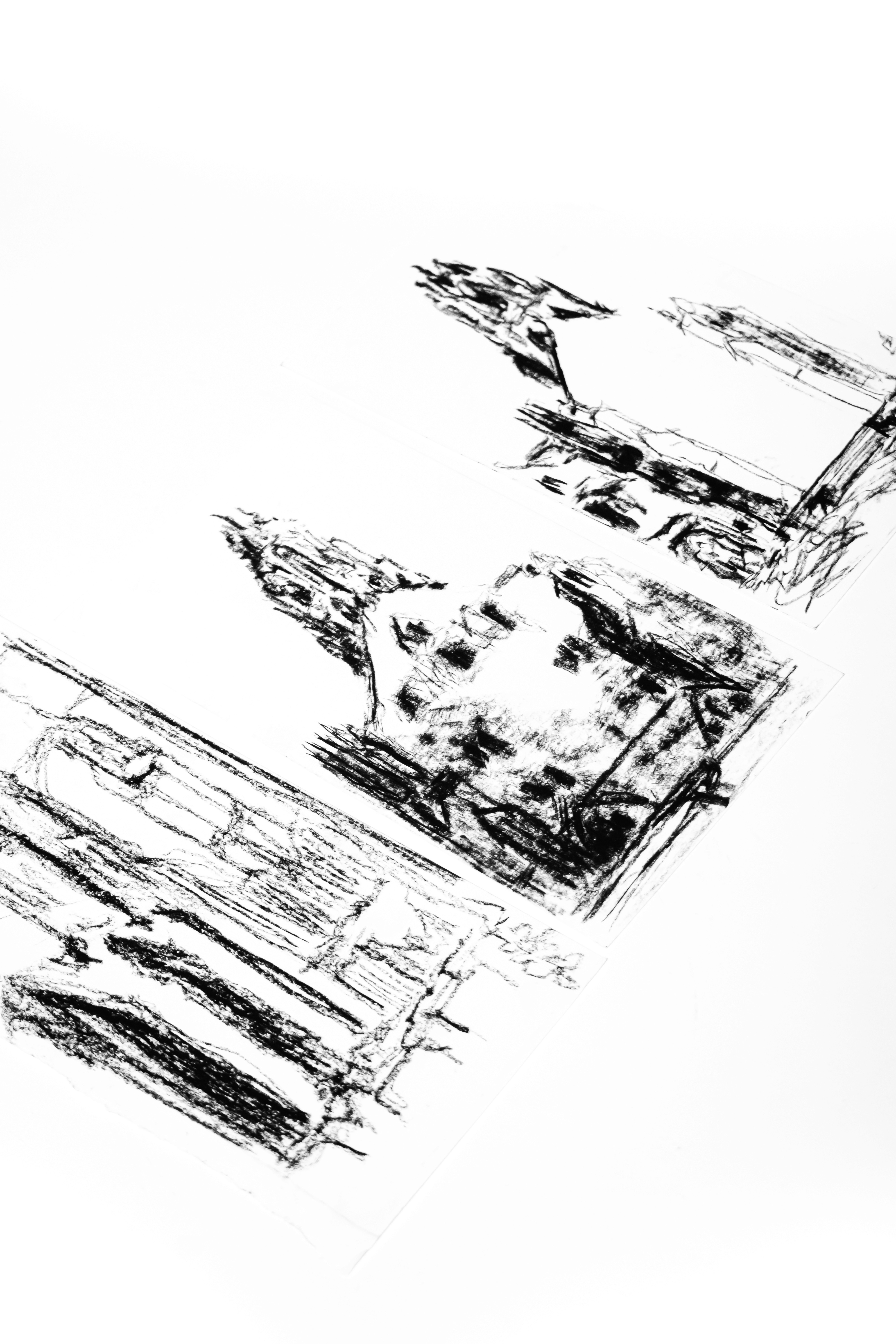 Charcoal sketches of harkness tower and residential colleges.