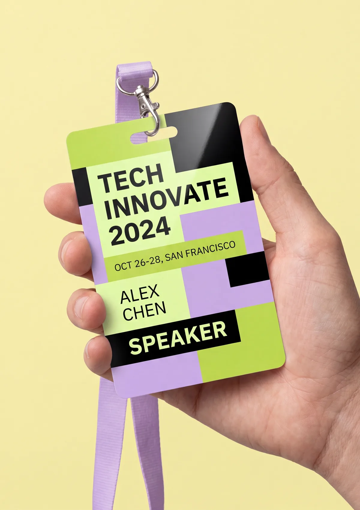 Conference badge with printed name and speaker role