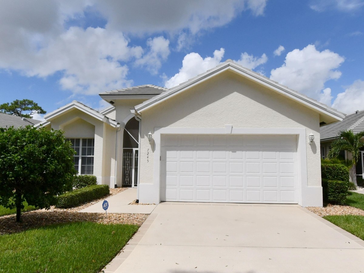 1994 New Roof Construction in Marsh Landing, PGA Village, Port St Lucie with Entegra Flat Broomswept Tile in Natural Gray