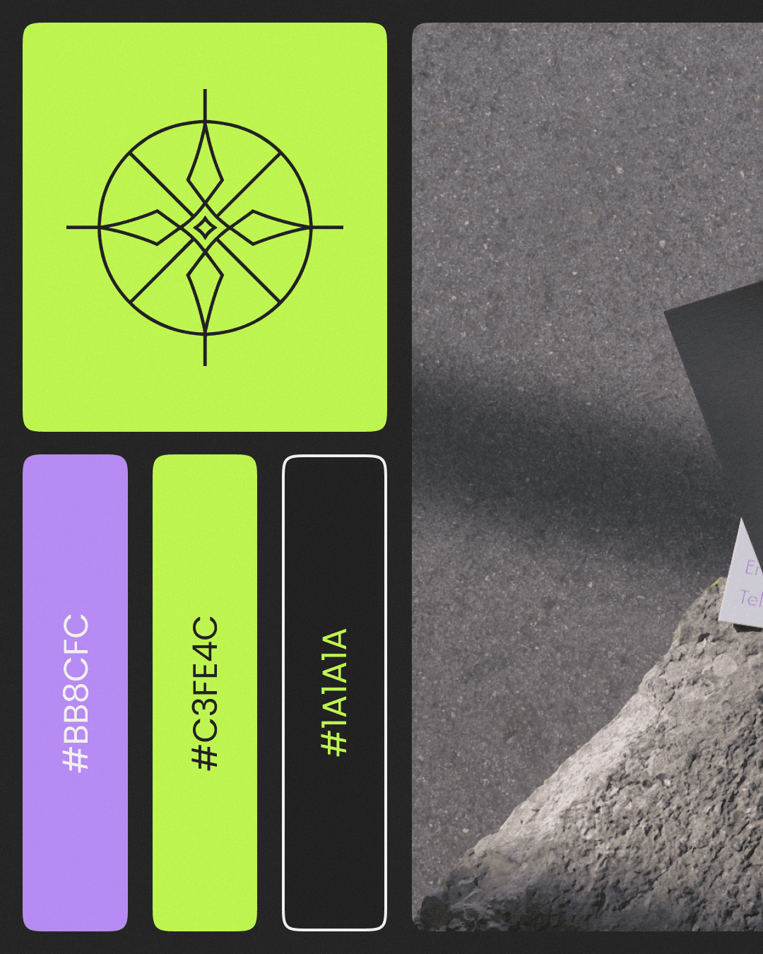 Modern architectural workspace with large floor-to-ceiling windows, surrounded by trees, and desks filled with design materials and books. Two blurred figures are walking through the space.