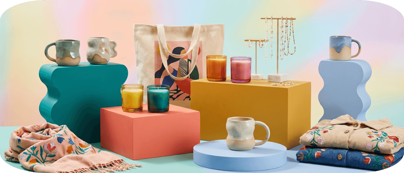 Popular handmade Etsy products including candles, mugs, jewelry, and embroidered clothing displayed for online marketplace sales.