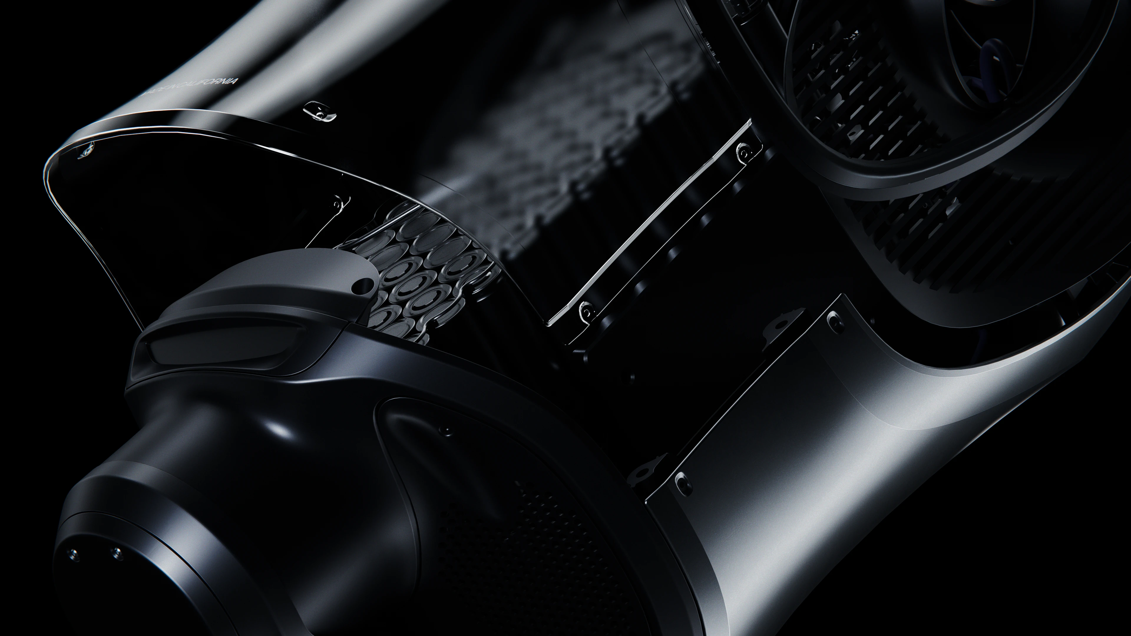 A fast black sports car races down the highway.