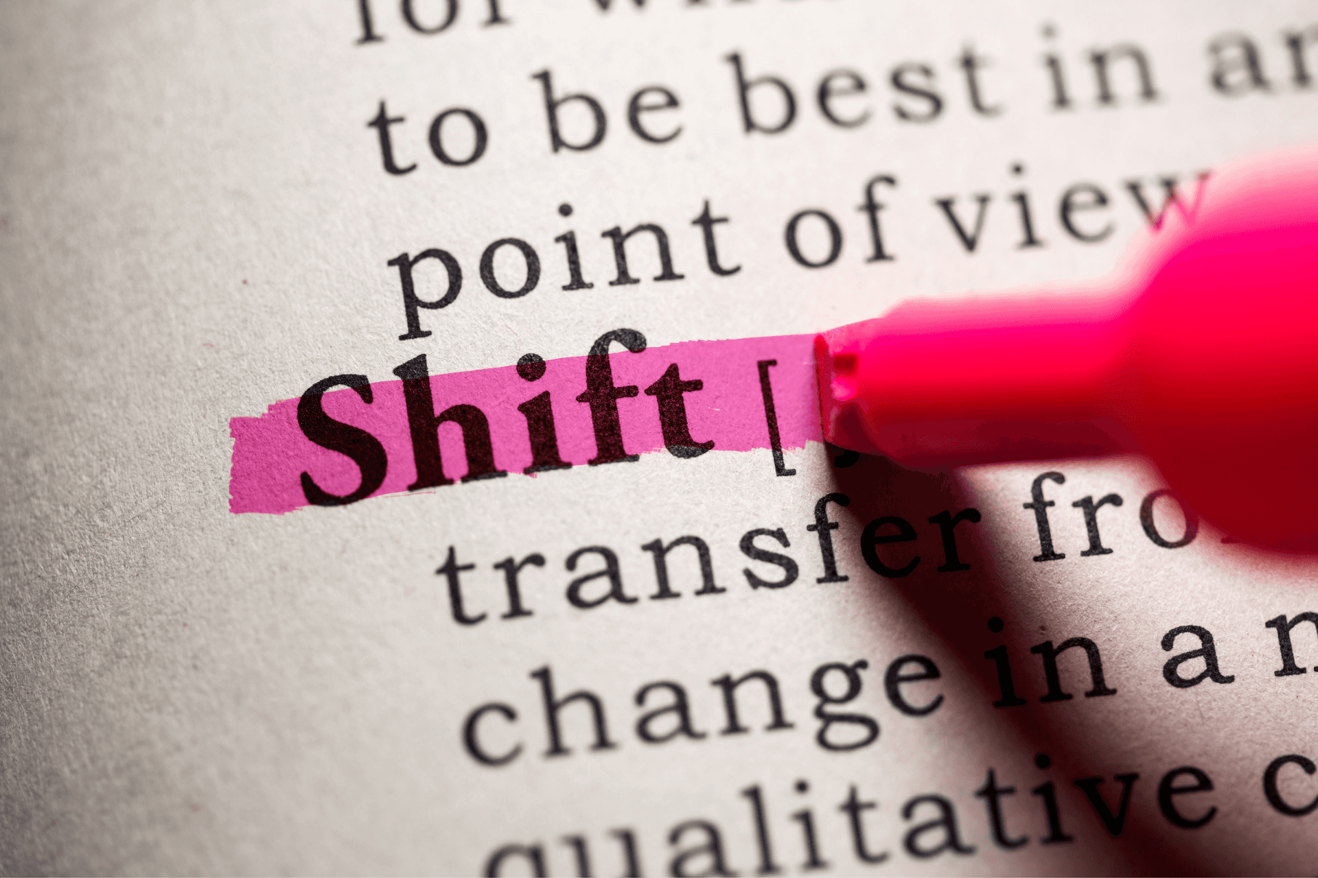 The word 'shift' highlighted in pink on a dictionary page emphasizing mindset transformation and change.