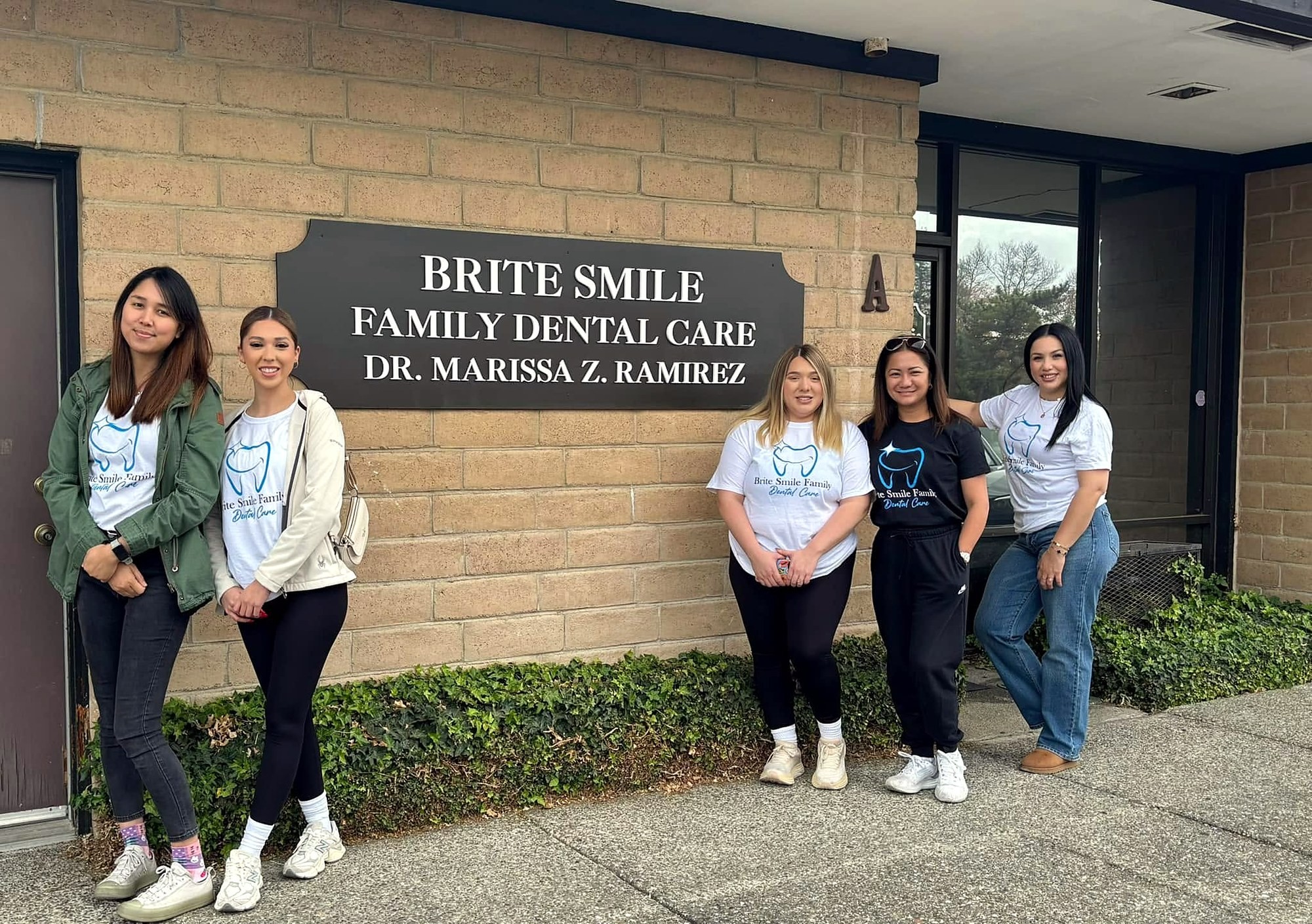 The Brite Smile Family Dental Care team outside the office