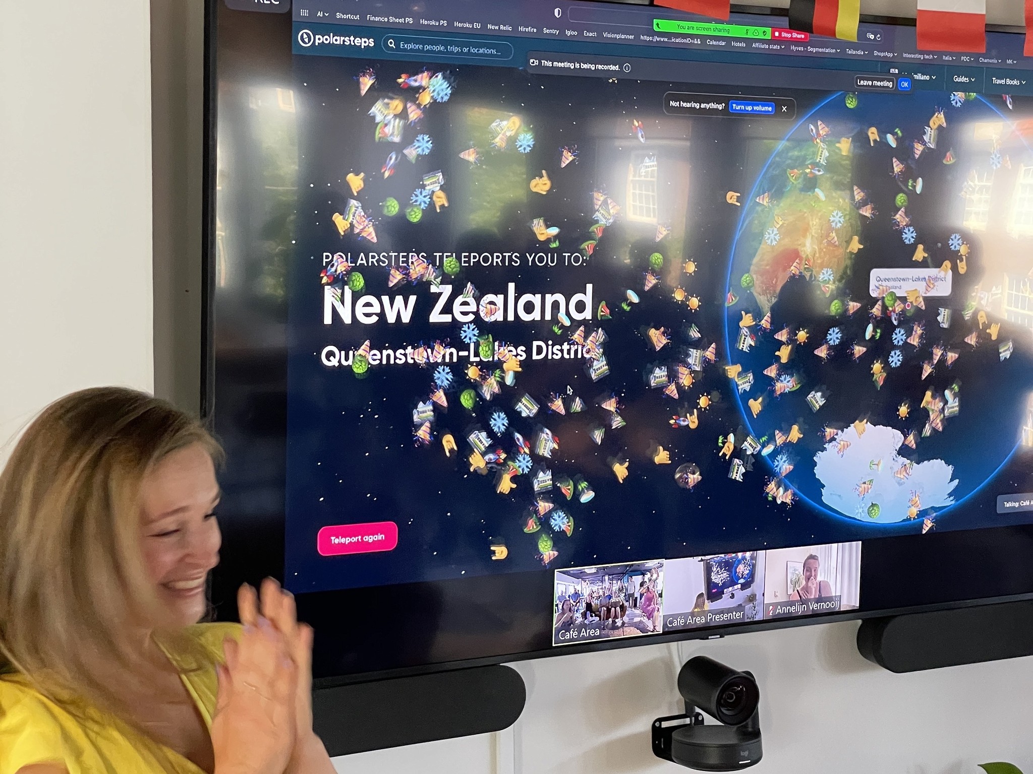 A bird's-eye view of the ancient Incan city of Choquequirao, whose ruins look like geometric shapes against the greenery that surrounds it