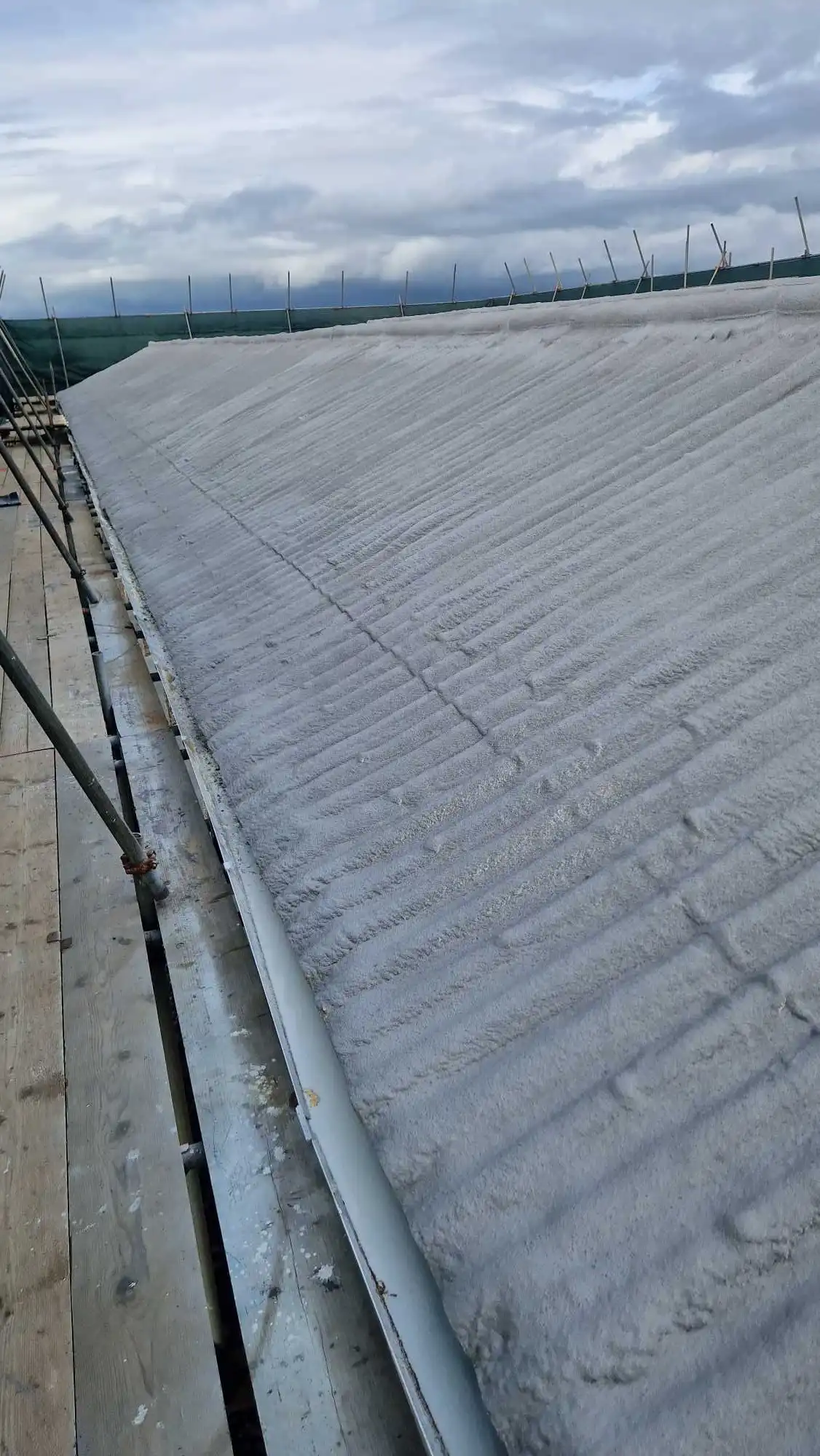 asbestos roof insulated with spray foam