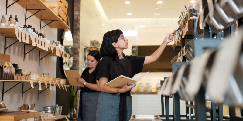 Malaysian employee working in a retail store