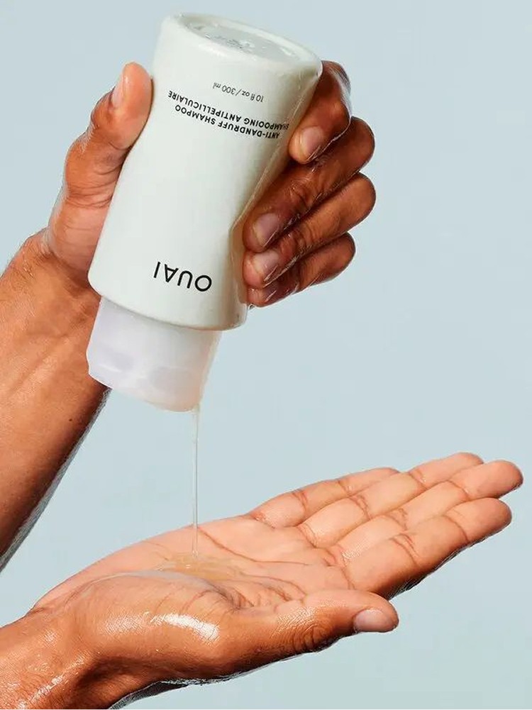 Person pouring Ouai product onto their hands