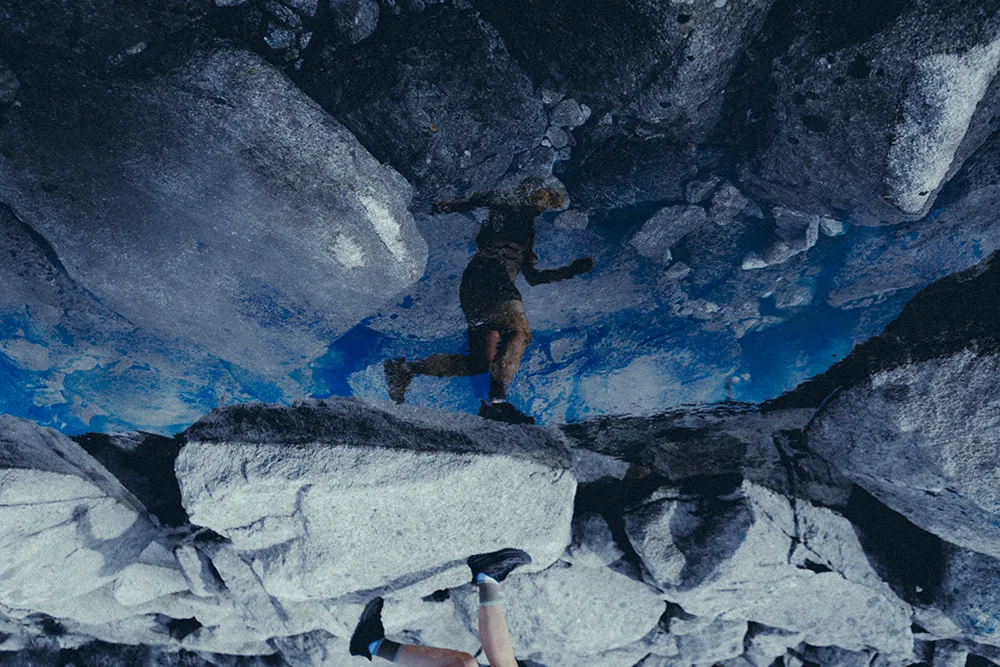 Soar Running — picture of running girl in ice reflection.