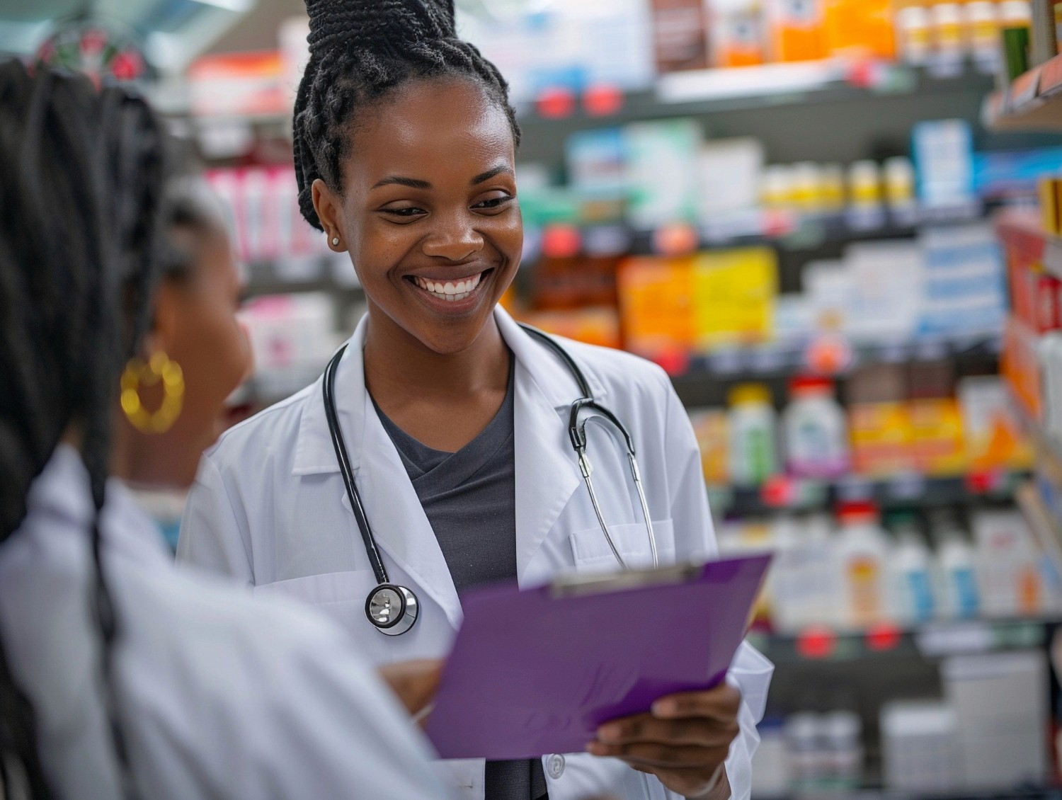 friendly female pediatrician touches shoulder teenage