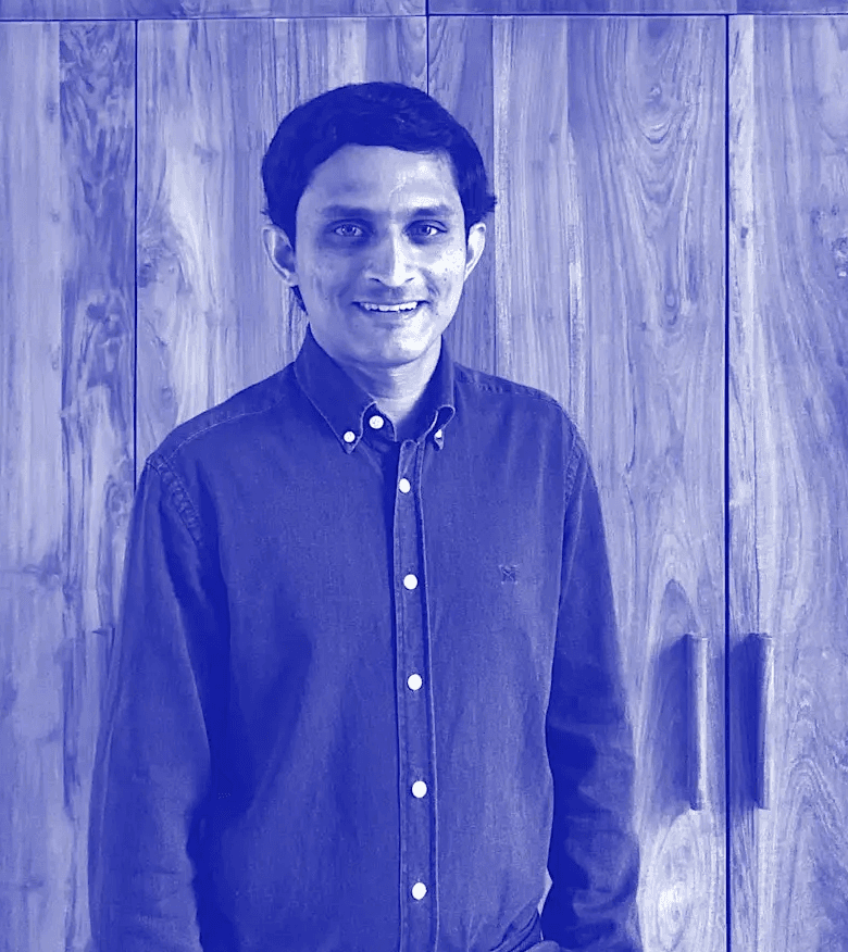 a group of women standing on top of a sandy beach