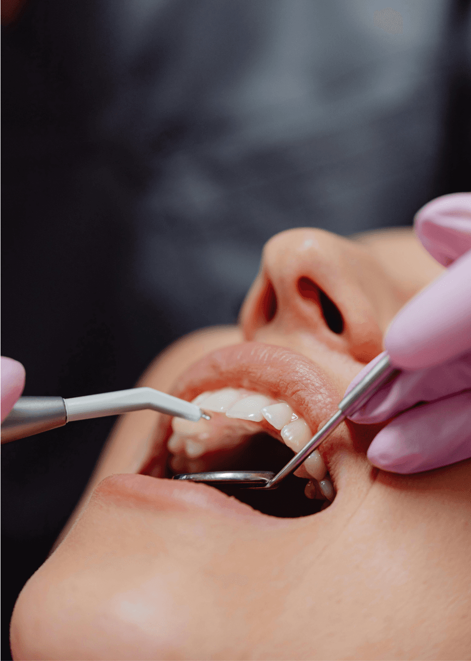 a dentist in davao doing a dental check up for a patient