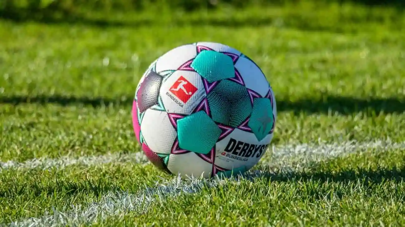 An official Bundesliga footballer on the pitch - a symbol of the exciting world of professional football, where Marie-Louise Eta is making history as the first female assistant coach at Union Berlin. This ground-breaking appointment marks a turning point and opens the door to a more inclusive future in sport.