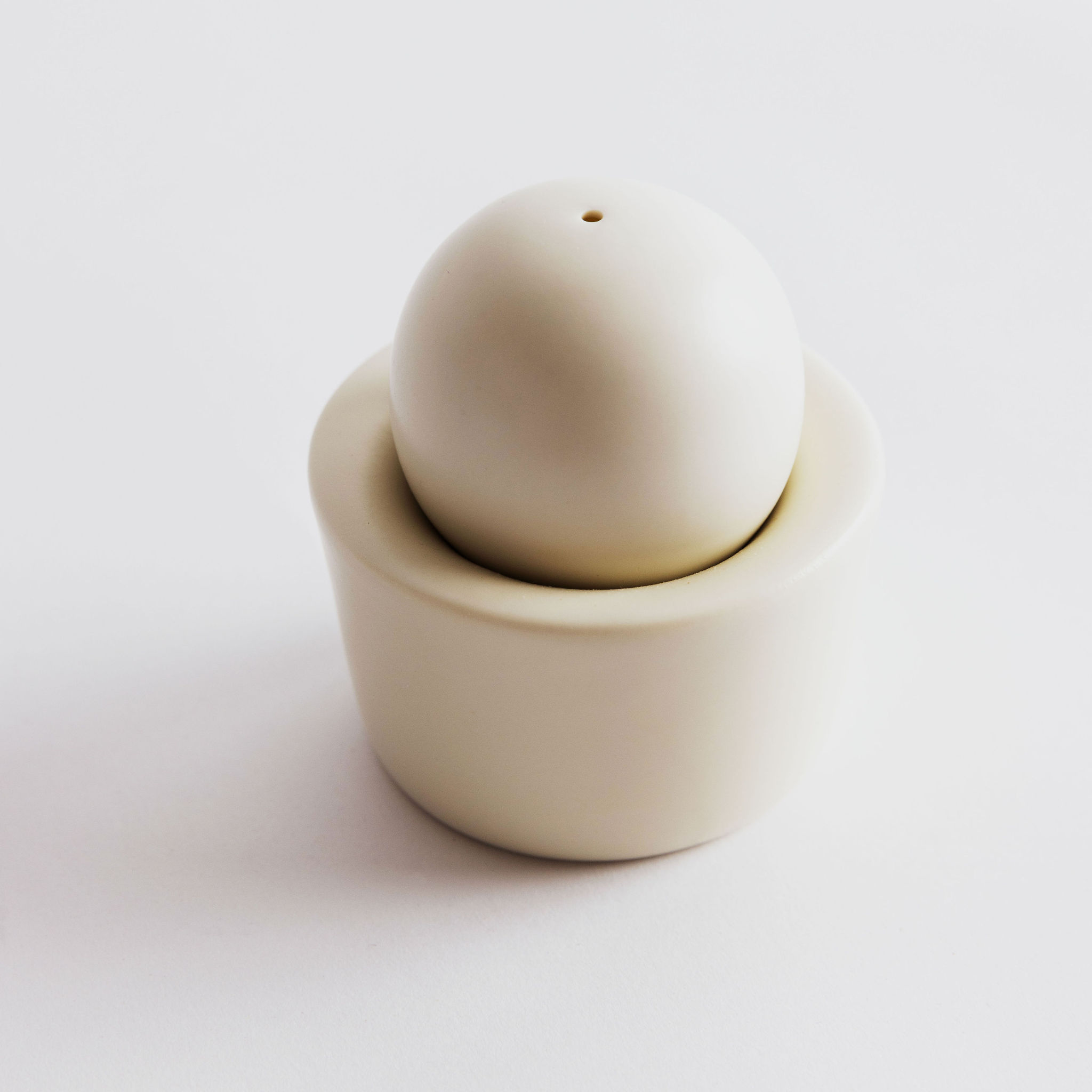 American flag flying against a cloudy sky