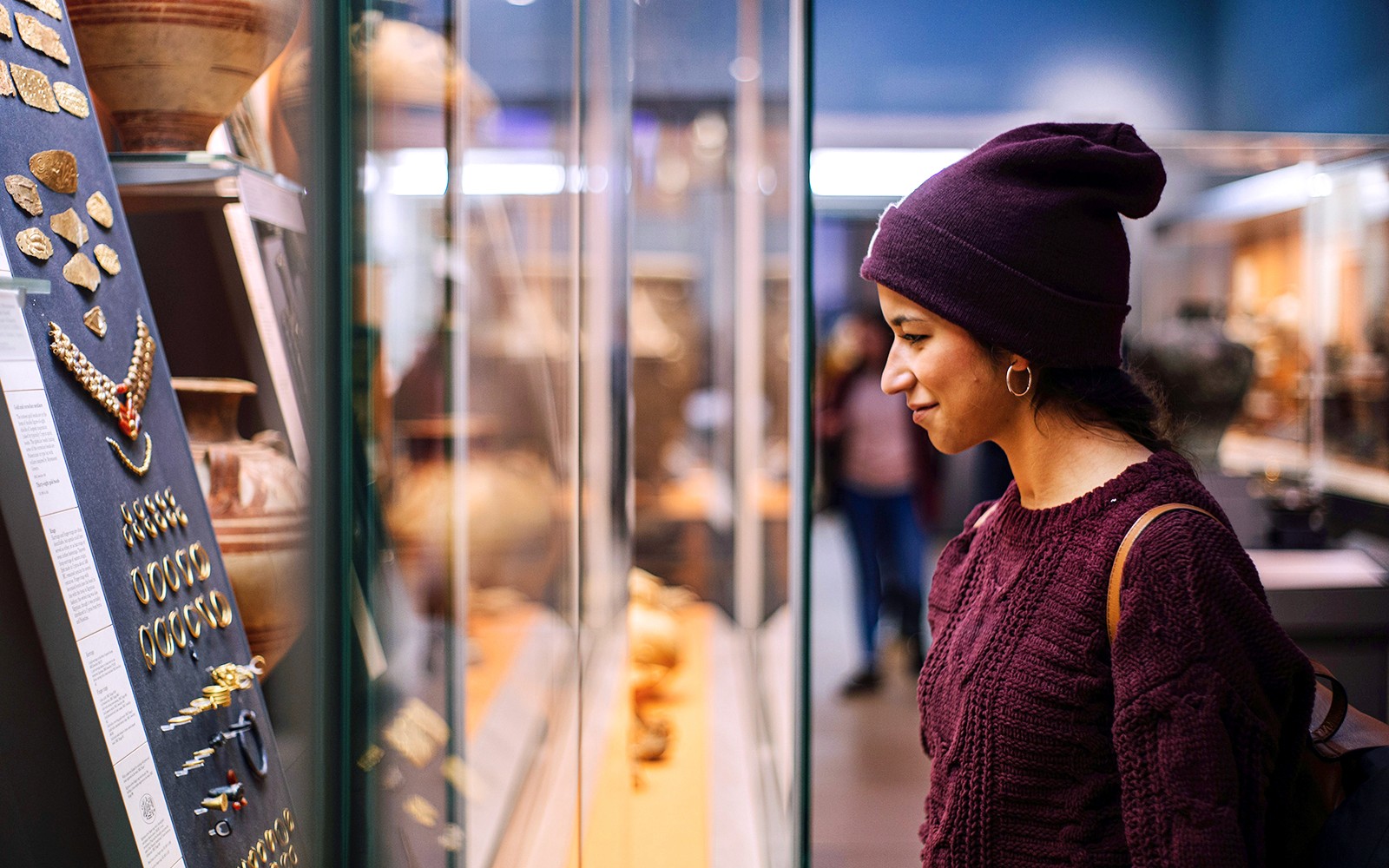 A female tourist exploring inside the British Museum