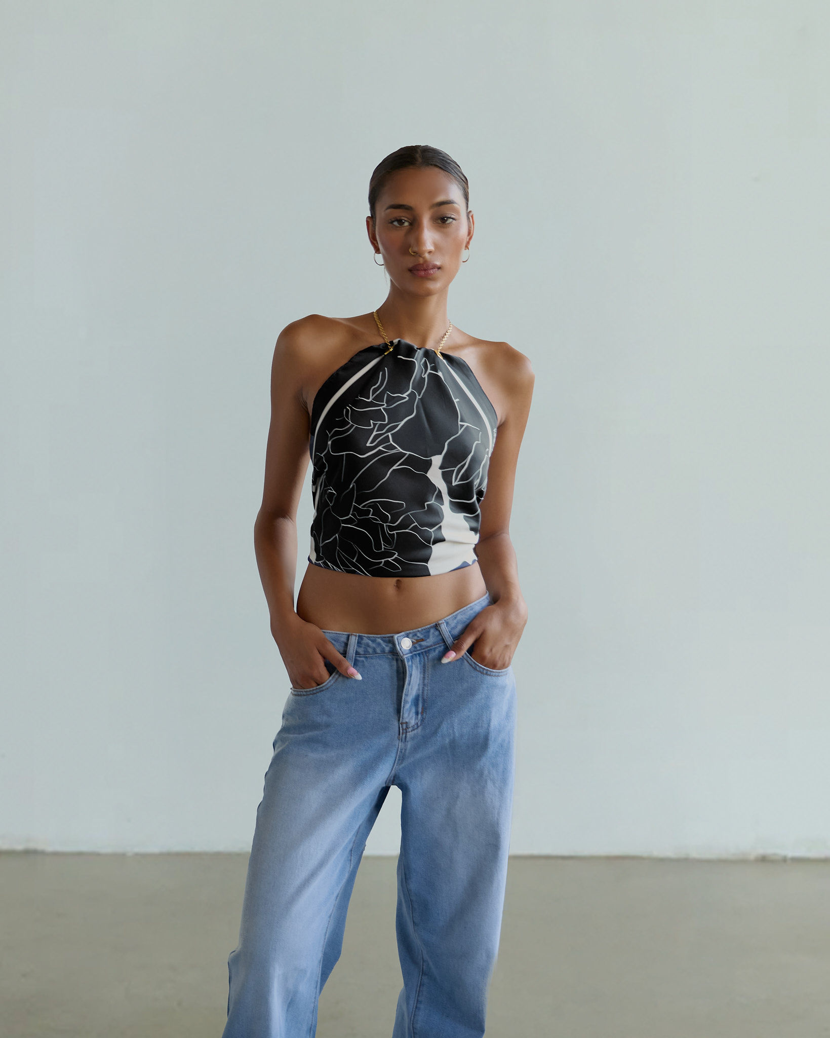 American flag flying against a cloudy sky