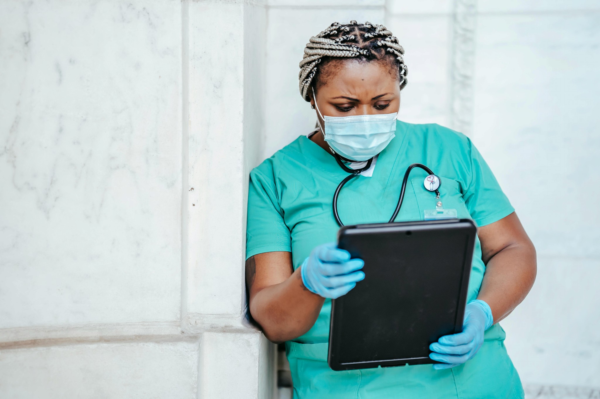 Nurse looking at tablet
