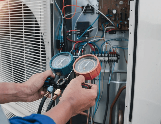 Man installing an air humidifier in a Toronto home