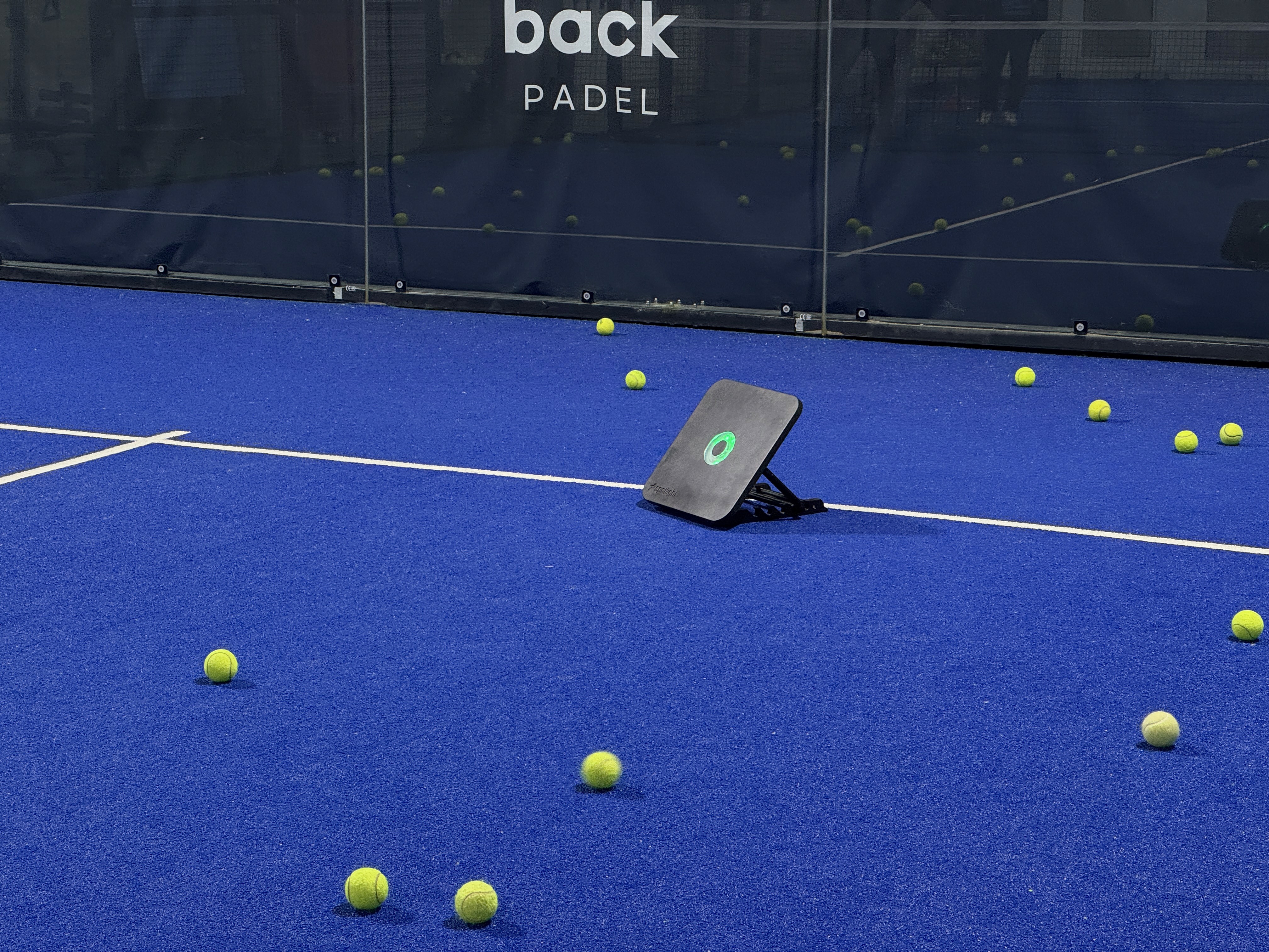 2 men playing soccer on green grass field during daytime