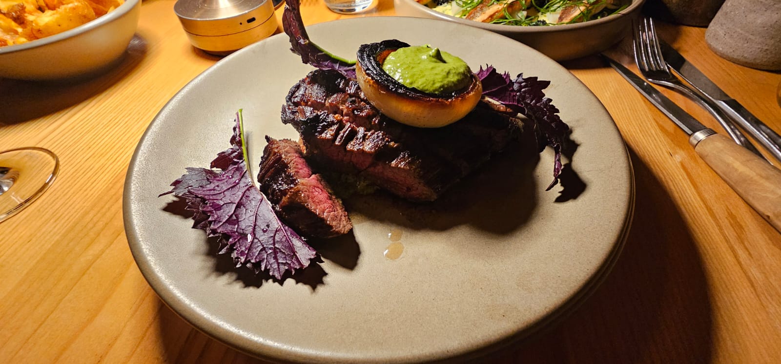Seared Wagyu steak with cipollini onion and green sauce at Sherwood Queenstown.