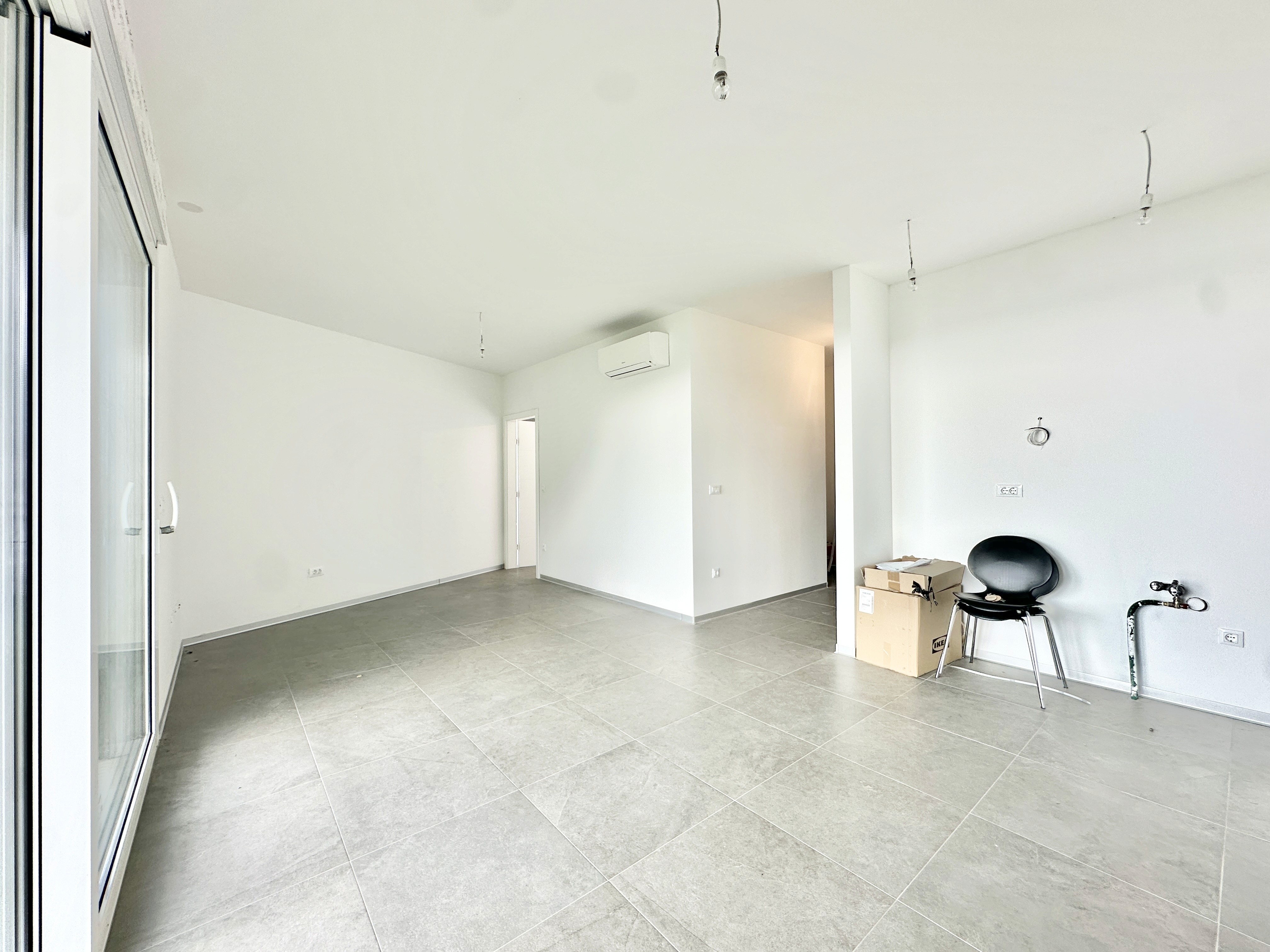 Ornate classic bathroom with claw-foot tub and wood paneling.