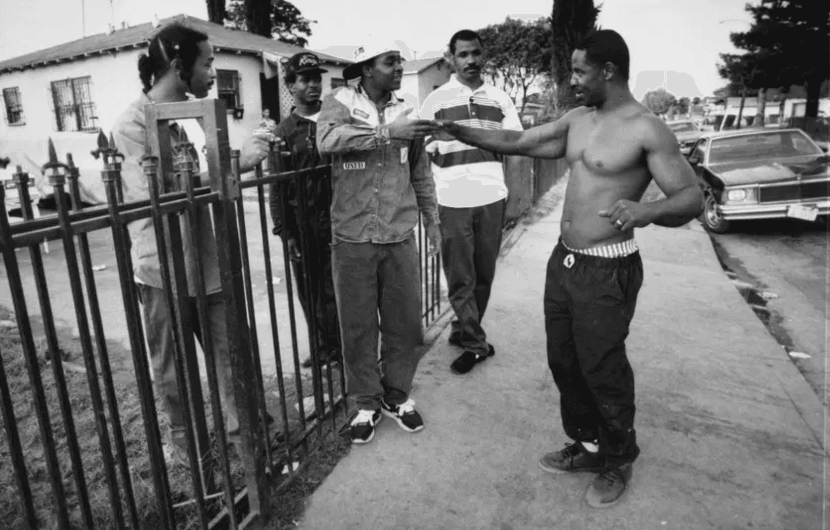 Group of young Black men hanging out together and talking.
