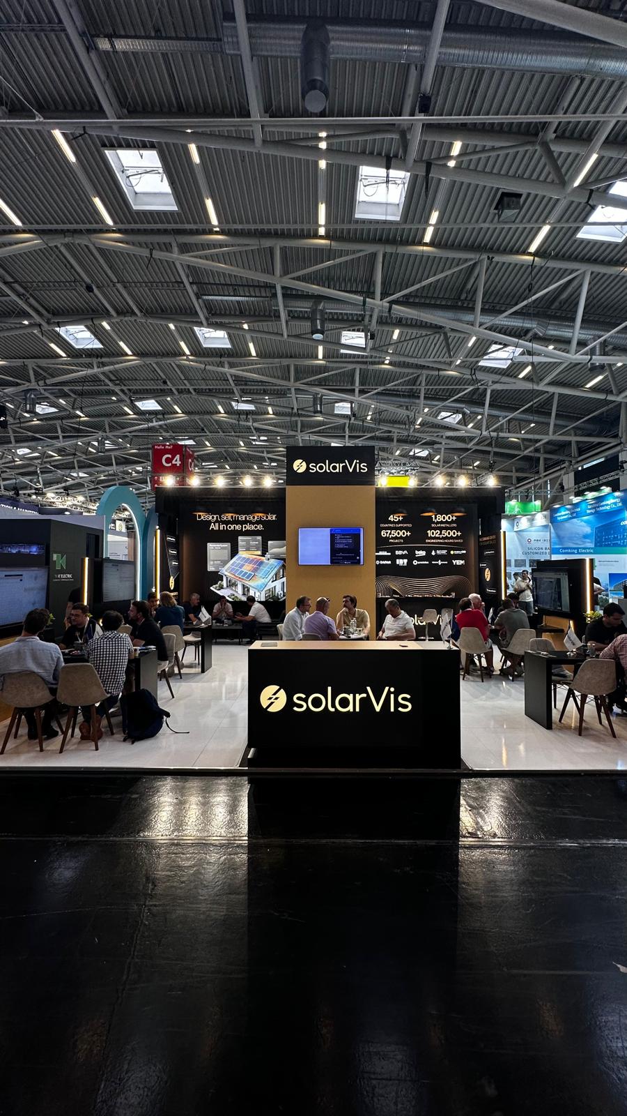 Bar and hospitality area at the SolarVis stand, designed for catering and visitor engagement.
