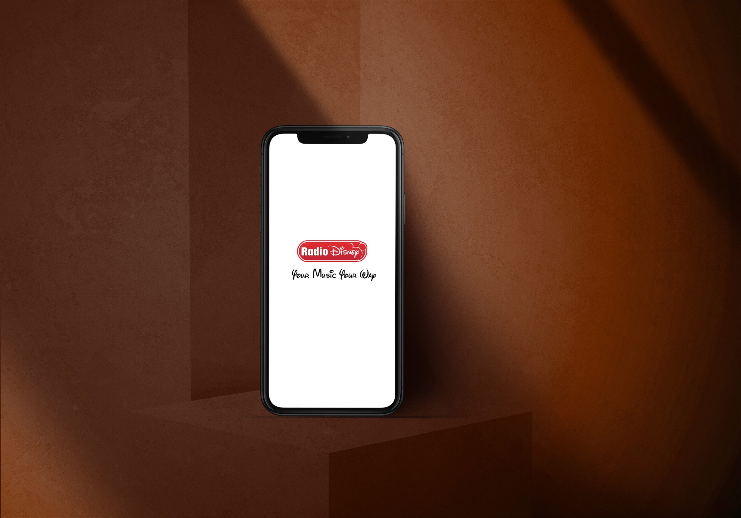 A mockup of a Macbook with the header of the website