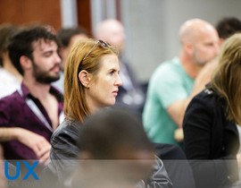 Woman talking to a Man using Mic