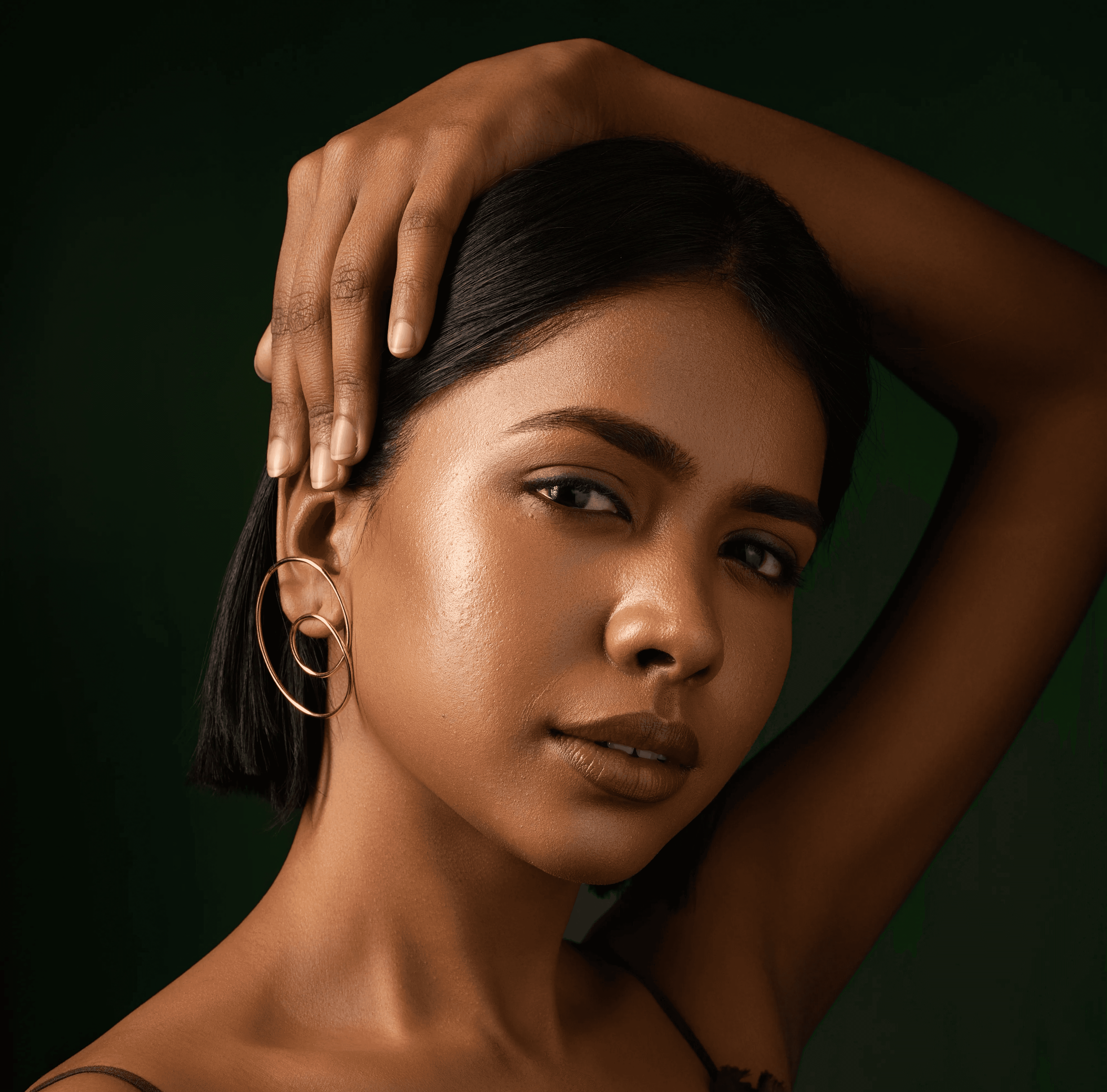 a woman holding a red flower