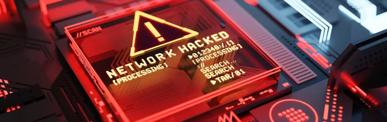 A digital illustration displays a futuristic red and black interface with a warning sign that reads "Network Hacked," symbolizing cyber risk management challenges, relevant to risk engineering and insurance underwriting software.