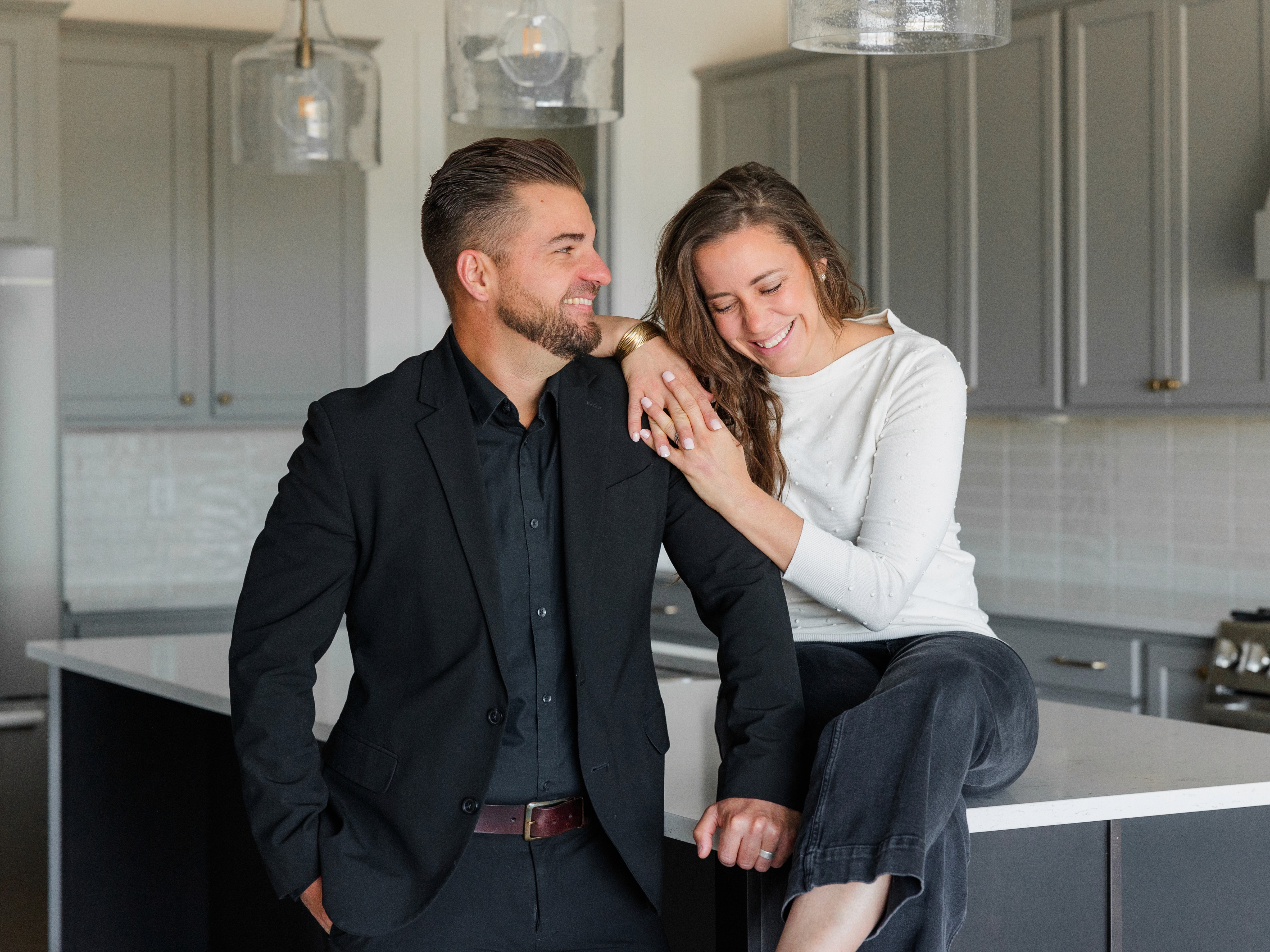 goofy puppy peeking through a paper hole 