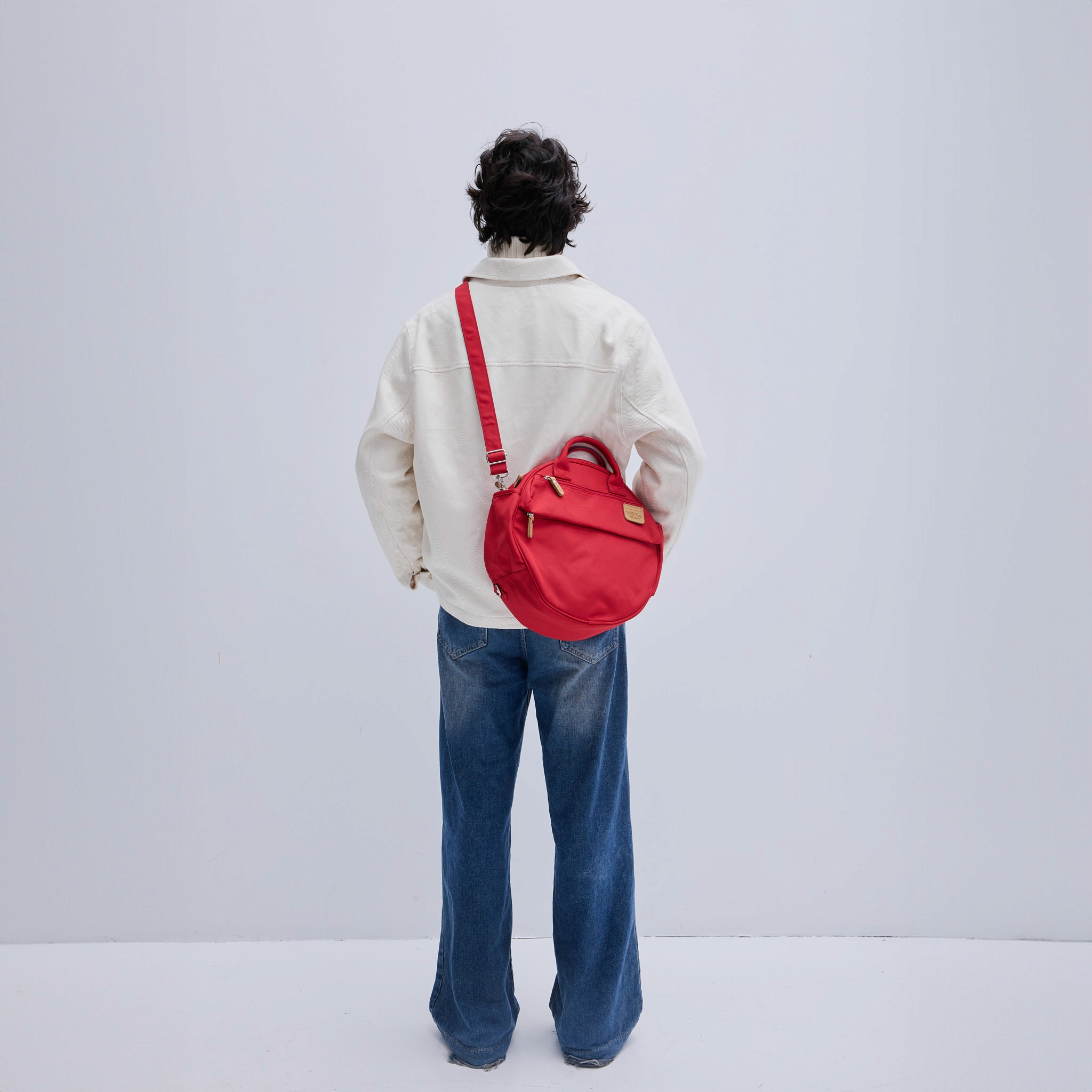 American flag flying against a cloudy sky