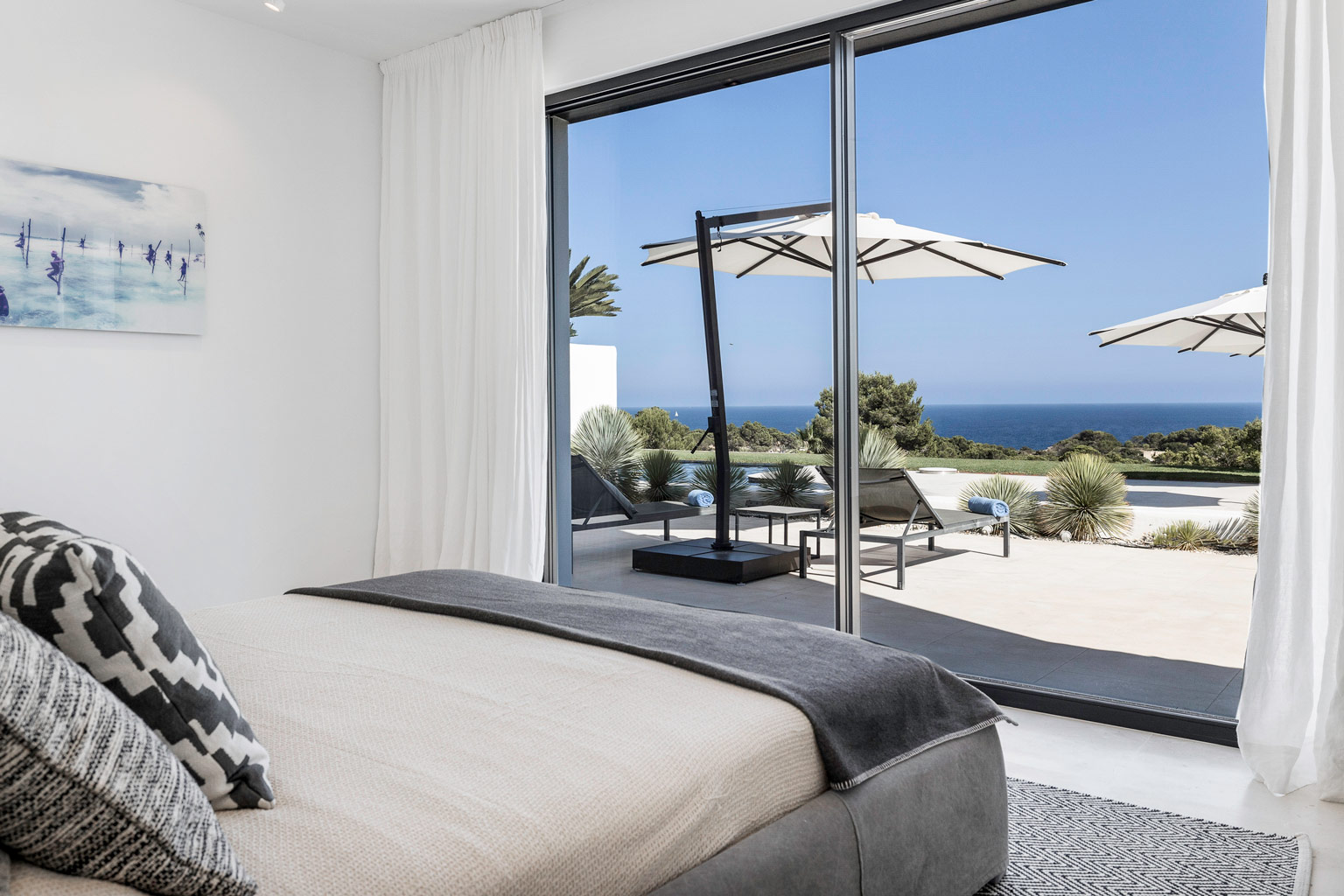 Suite One sea view bedroom at luxury villa Ibiza, private wedding events holiday retreat.