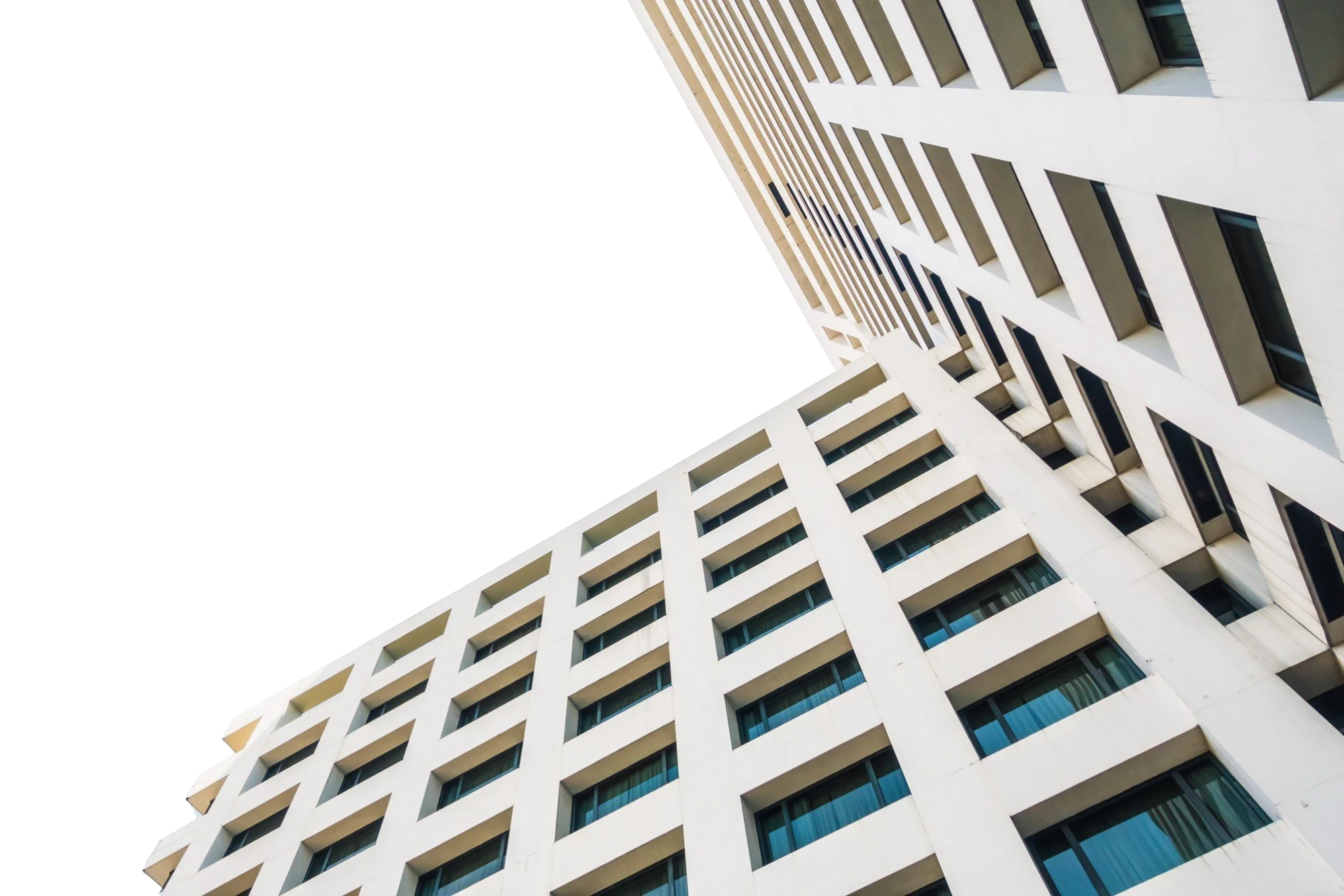 An image of a white apartment building in perpective view with several floors and windows.