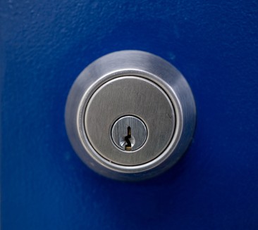 deadbolt installed on blue door