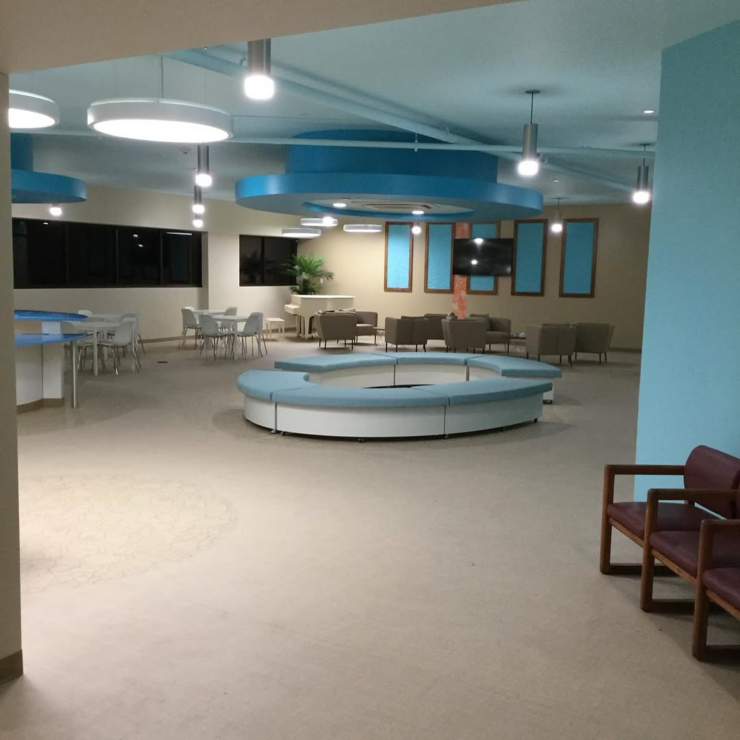 Completed lobby in service with its curved inlay floor and seating